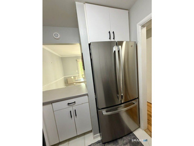 Beautifully updated 2bedroom, 1.5bath unit located in the rear - photo 11
