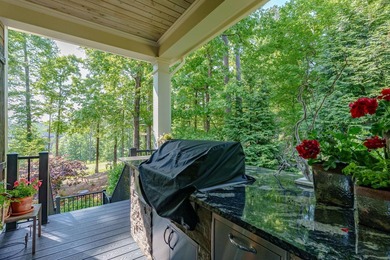 LIKE NEW CUSTOM HOME POSITIONED ALONG THE 11TH HOLE OF THE CREEK - photo 15