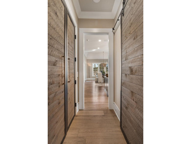LIKE NEW CUSTOM HOME POSITIONED ALONG THE 11TH HOLE OF THE CREEK - photo 19