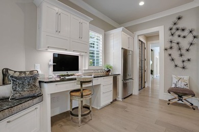LIKE NEW CUSTOM HOME POSITIONED ALONG THE 11TH HOLE OF THE CREEK - photo 21