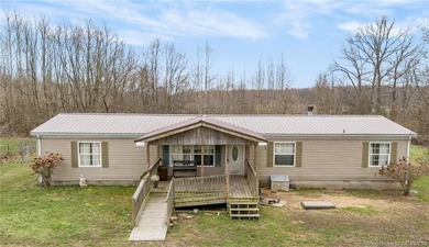 Looking for privacy, land, and value? This unique 4-bedroom, 2