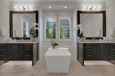 LIKE NEW CUSTOM HOME POSITIONED ALONG THE 11TH HOLE OF THE CREEK - photo 26