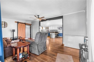 Looking for privacy, land, and value? This unique 4-bedroom, 2