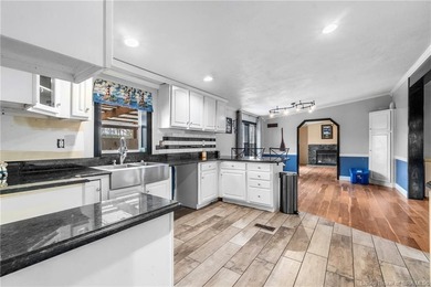 Looking for privacy, land, and value? This unique 4-bedroom, 2