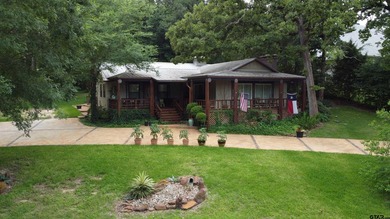 Enjoy the perfect blend of lake life, spacious yard and private - photo 1