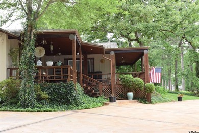 Enjoy the perfect blend of lake life, spacious yard and private - photo 9