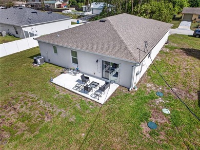 Step into this like-new 2021 concrete-block home featuring 4 - photo 3