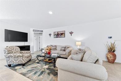 Step into this like-new 2021 concrete-block home featuring 4 - photo 8