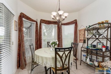 Enjoy peaceful golf course living in this well-maintained - photo 5