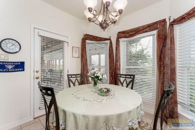 Enjoy peaceful golf course living in this well-maintained - photo 6