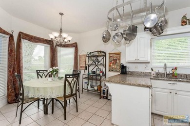 Enjoy peaceful golf course living in this well-maintained - photo 9