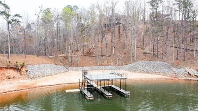 Escape to a world where luxury meets the water's edge. Nestled - photo 2