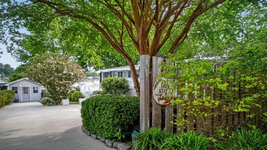 Welcome to 1204 Joyner Drive, a distinctive lakefront residence - photo 13