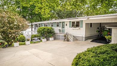 Welcome to 1204 Joyner Drive, a distinctive lakefront residence - photo 14
