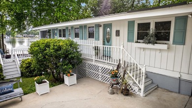 Welcome to 1204 Joyner Drive, a distinctive lakefront residence - photo 15