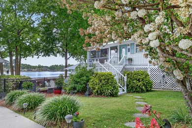 Welcome to 1204 Joyner Drive, a distinctive lakefront residence - photo 18