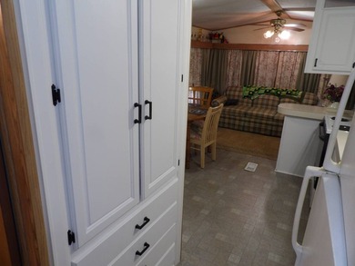 This cozy and partially furnished, 12 X 33 1 BR 1 BA home with - photo 21