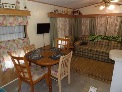 This cozy and partially furnished, 12 X 33 1 BR 1 BA home with - photo 33