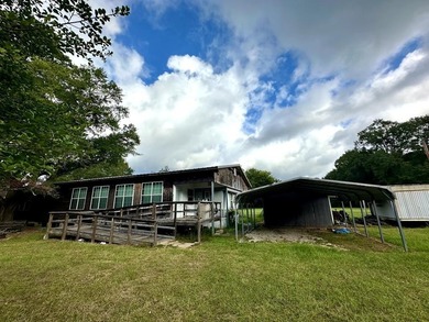 NEW PRICE! Calling CASH buyers! Discover this .46-acre - photo 2