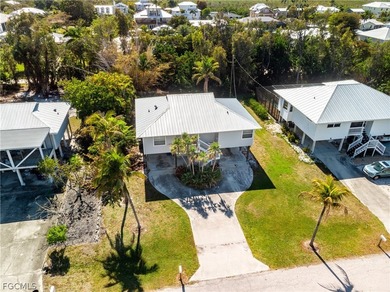 Captains Cove, 2- bedrooms 2.5- baths, Piling Home and pool at - photo 3