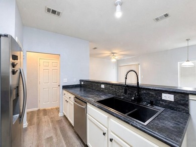 Discover this spacious two-story, three-bedroom townhome in - photo 9