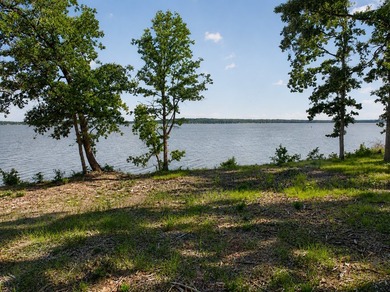 Discover an exceptional 11.43-acre waterfront retreat offering - photo 1