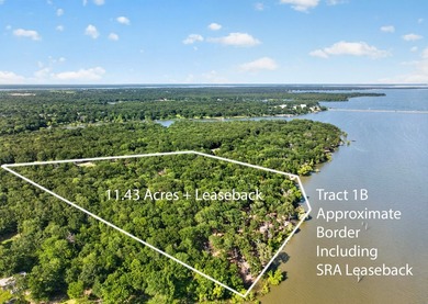 Discover an exceptional 11.43-acre waterfront retreat offering - photo 5