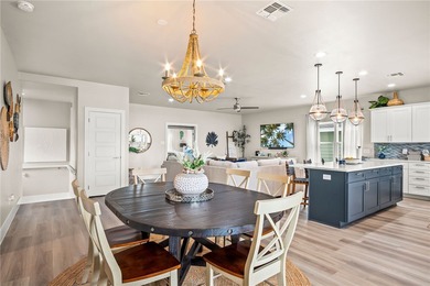 Experience local island life in this gorgeous 4-bedroom, 3-bath