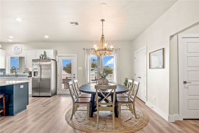 Experience local island life in this gorgeous 4-bedroom, 3-bath
