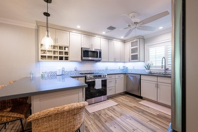 Island living is effortless in this exceptional 3-bedroom - photo 11