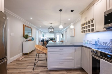 Island living is effortless in this exceptional 3-bedroom - photo 12