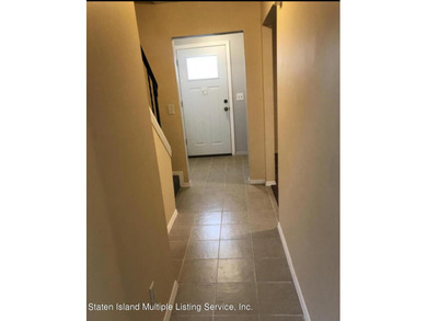 WHY RENT WHEN YOU CAN OWN? AFFORDABLE TOWNHOUSE IN MIDLAND BEACH - photo 2
