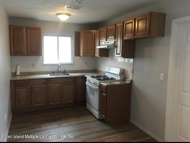 WHY RENT WHEN YOU CAN OWN? AFFORDABLE TOWNHOUSE IN MIDLAND BEACH - photo 3