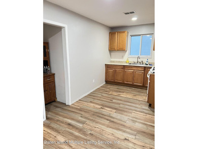 WHY RENT WHEN YOU CAN OWN? AFFORDABLE TOWNHOUSE IN MIDLAND BEACH - photo 5