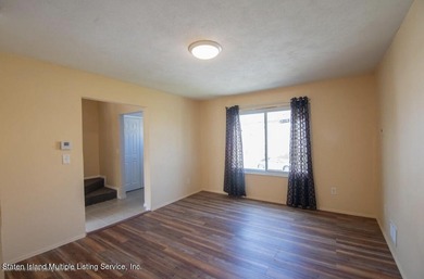 WHY RENT WHEN YOU CAN OWN? AFFORDABLE TOWNHOUSE IN MIDLAND BEACH - photo 6