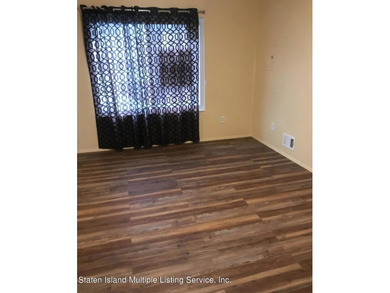 WHY RENT WHEN YOU CAN OWN? AFFORDABLE TOWNHOUSE IN MIDLAND BEACH - photo 7