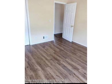WHY RENT WHEN YOU CAN OWN? AFFORDABLE TOWNHOUSE IN MIDLAND BEACH - photo 10