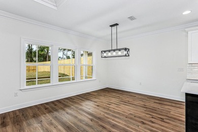 Stunning craftsmanship in this new construction all-brick - photo 9