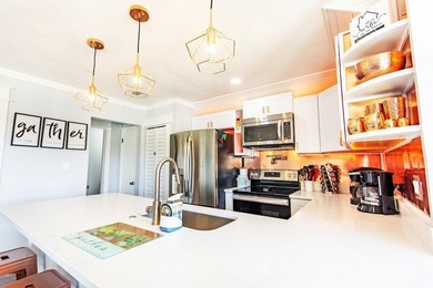 Welcome to Copper Cay -- a stylish coastal retreat in the heart - photo 5