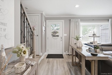 Welcome to this MINT Cape Cod-style home nestled in the heart of - photo 3