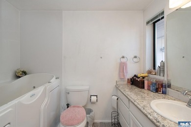 Perched on a high-bank overlooking the waterfront, this property - photo 29