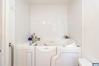 Perched on a high-bank overlooking the waterfront, this property - photo 30