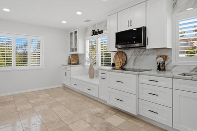 Perched on a beautifully maintained 0.35-acre homesite - photo 4