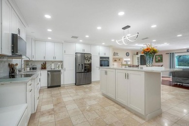 Perched on a beautifully maintained 0.35-acre homesite - photo 7