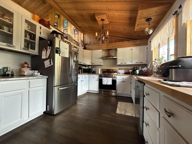 SPRING RIVER FRONT HOME - Rustic 3 bedroom, 2 bath home on - photo 6