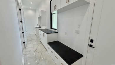 Experience elevated contemporary living in this exceptional - photo 9
