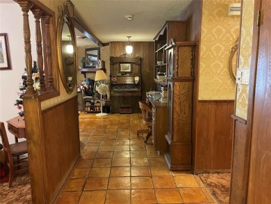 Welcome to 712 S. Dixie, a spacious 3-bedroom, 2-bath brick home