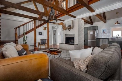 Rustic charm meets modern comfort in this beautifully log cabin - photo 4