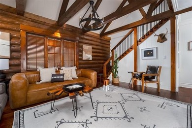 Rustic charm meets modern comfort in this beautifully log cabin - photo 5