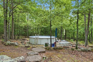 Tucked away in the Ozarks on 40 breathtaking acres, this - photo 37